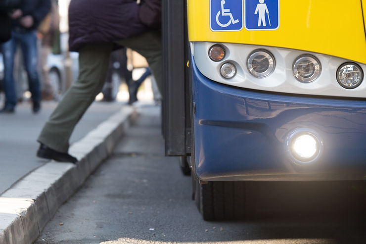 man boarding a bus